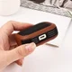 Airpods Pro 1/2 Kunstlederen Schokbestendig Hoesje Zwart/Groen afbeelding 2